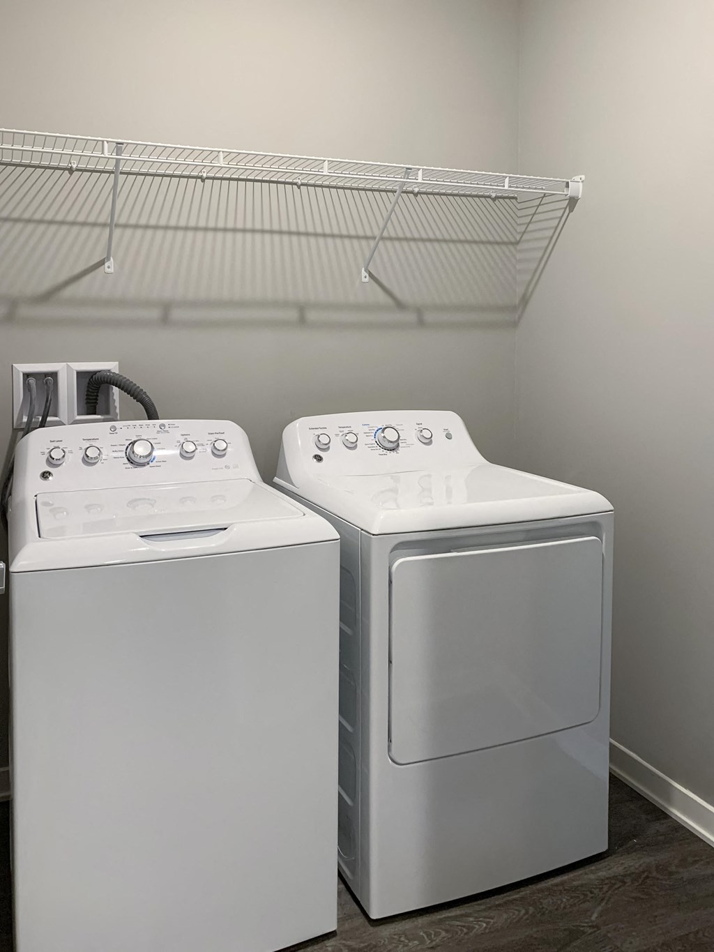 Washer and dryer closet with shelving space The Flats at Shadow Creek in Lincoln Nebraska