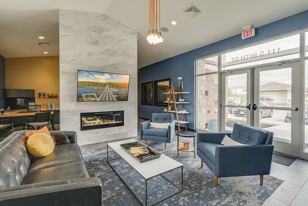Television and seating area in the clubhouse at The Flats at Shadow Creek