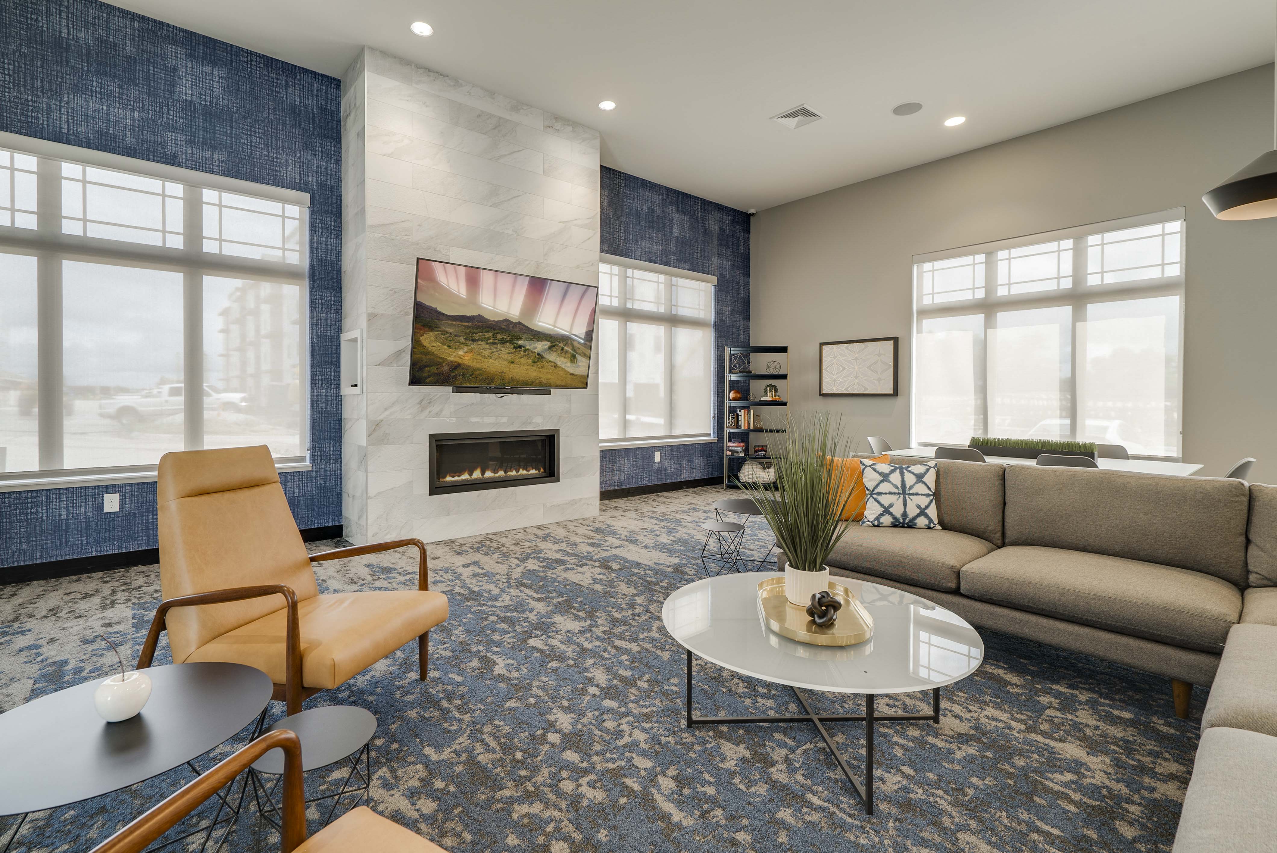 The beautiful clubhouse and fireplace at The Flats at Shadow Creek new luxury apartments in east Lincoln NE 68520