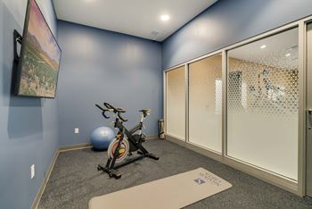 Private yoga and cycling studio at The Flats at Shadow Creek new luxury apartments in east Lincoln NE 68520