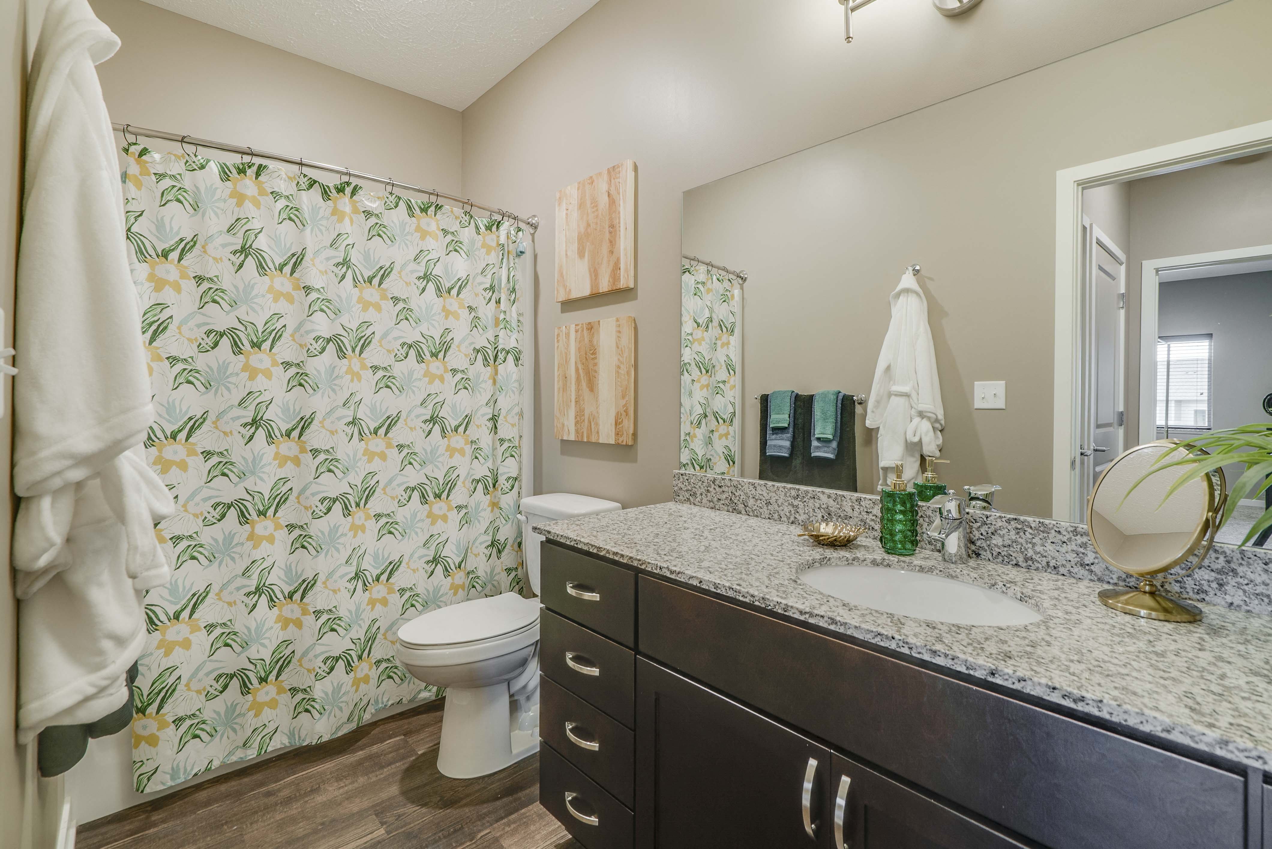 Large bathroom with granite countertop at The Flats at Shadow Creek new luxury apartments in east Lincoln NE 68520