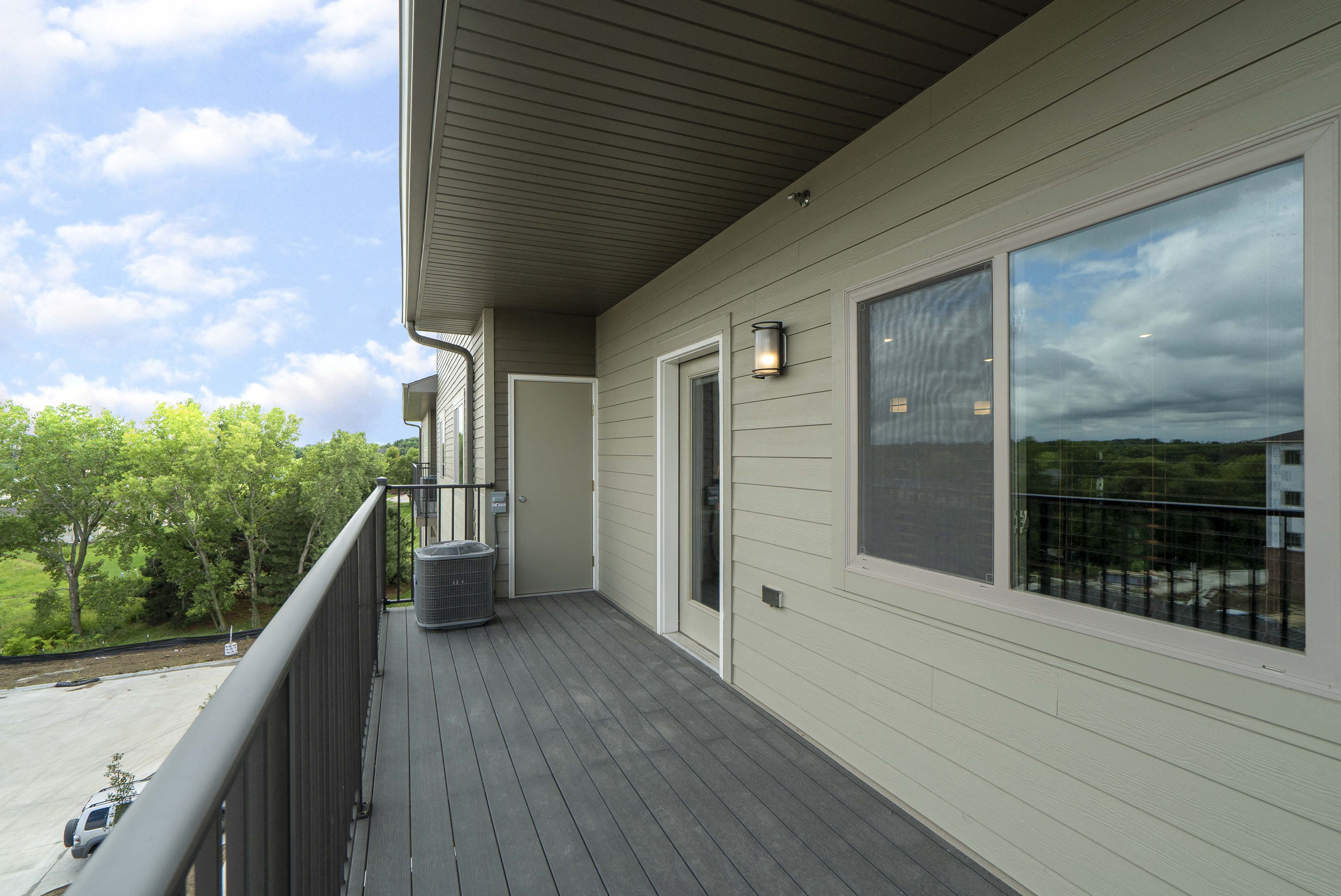 Spacious balcony and patio with beautiful views at The Flats at Shadow Creek new luxury apartments in east Lincoln NE 68520