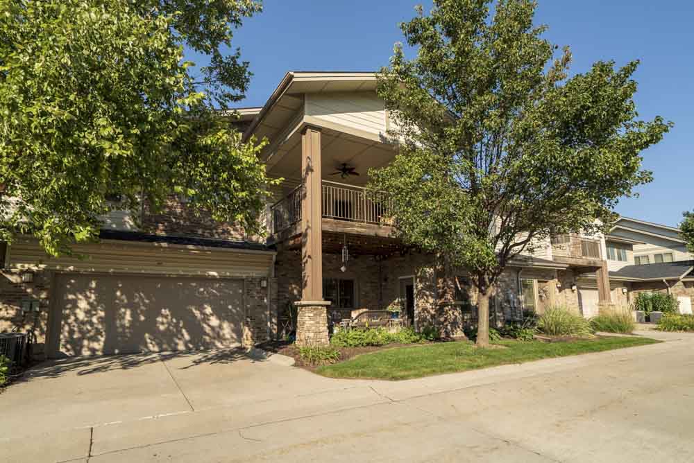 Townhome-style villas with one- and two-car attached garages  at Grand Legacy apartments and townhomes in west Omaha NE 68130