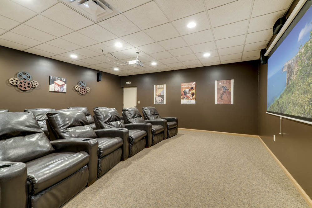 Theater room with theater seats  at Grand Legacy apartments and townhomes in west Omaha NE 68130