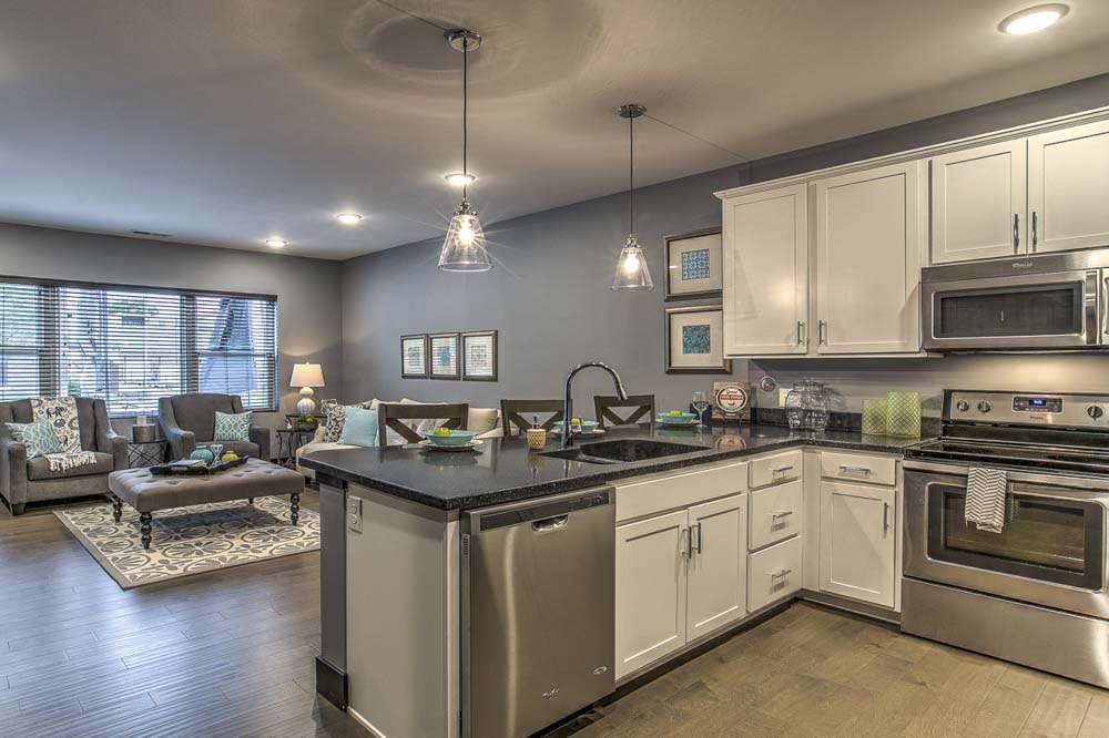 View of kitchen and living room from entrance at The Helen