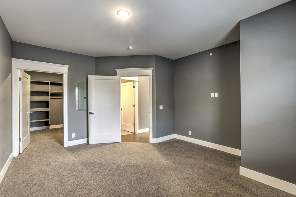 Large bedroom with spacious walk in closet at The Helen