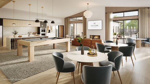 A modern dining room with a large table and chairs.