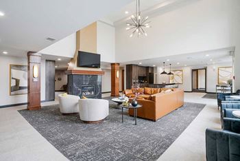 The clubhouse lounge featuring lounge seating and a community TV