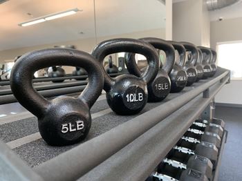 24 hour fitness center with kettlebells and dumbbells at the northbrook apartments in lincoln nebraska