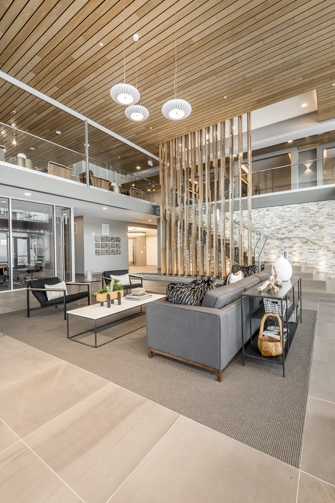 Clubhouse interior with seating area and skywalk