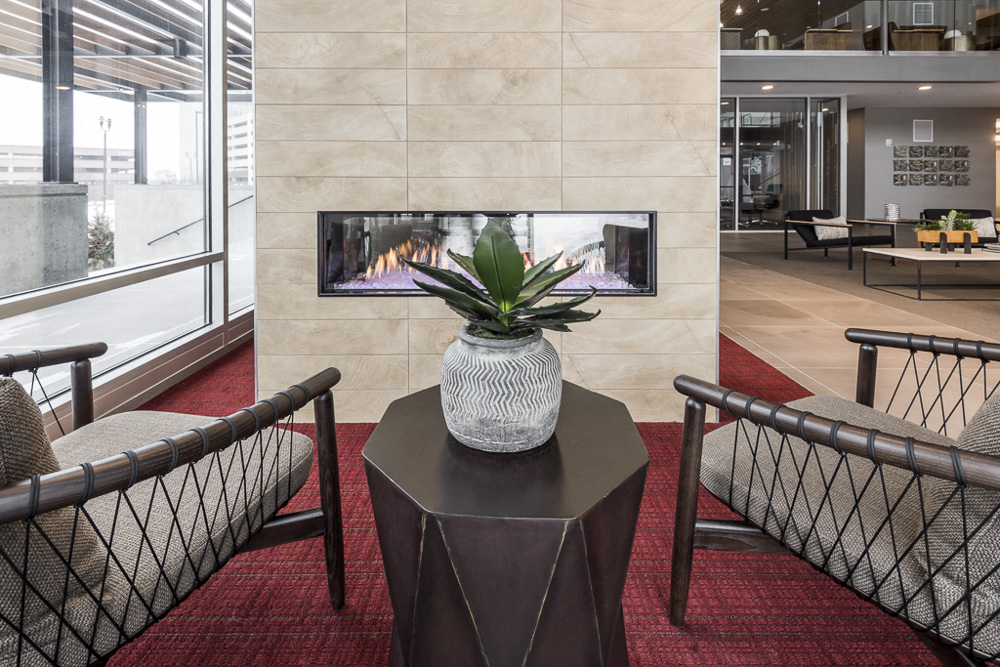 Seating next to designer fireplace at The Preserve's clubhouse