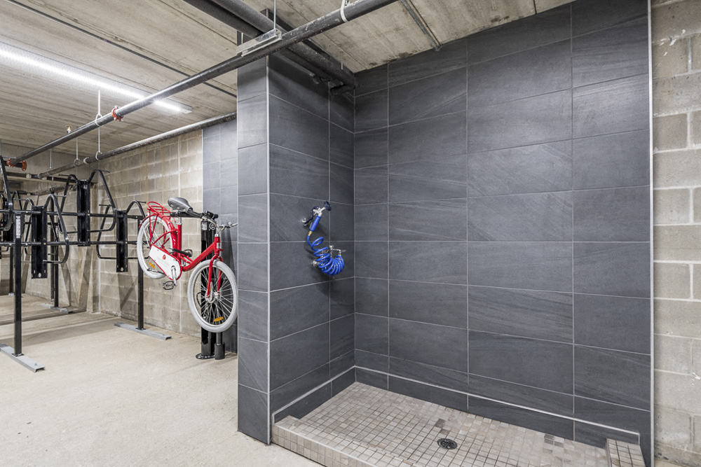 Bike wash station next to bicycle storage at The Preserve at Normandale Lake