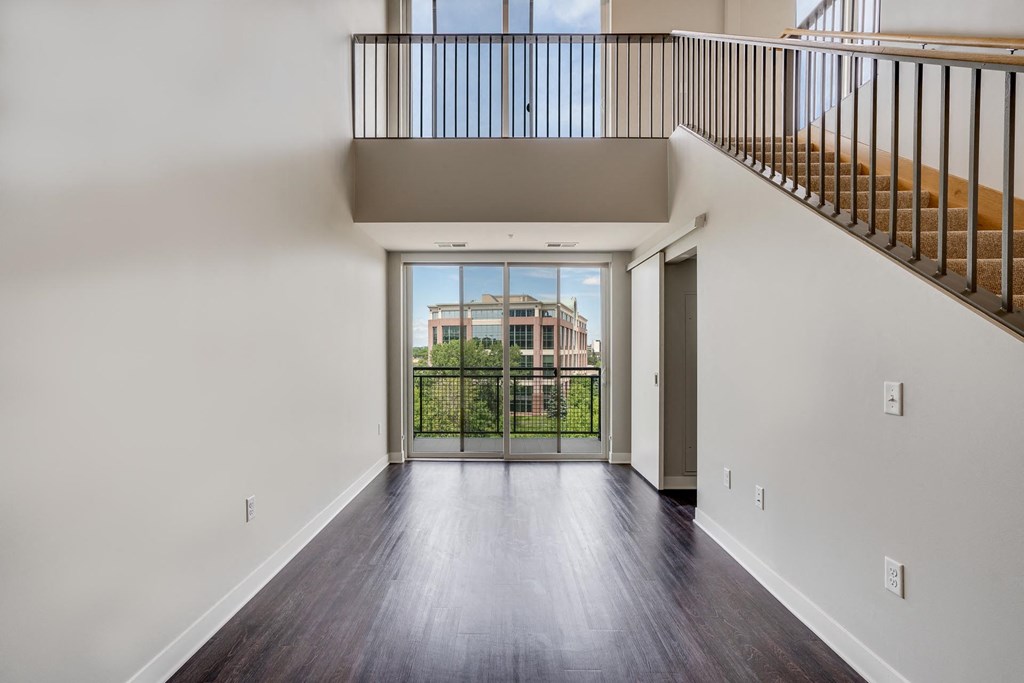 Large windows providing natural light in the living space at The Preserve at Normandale Lake