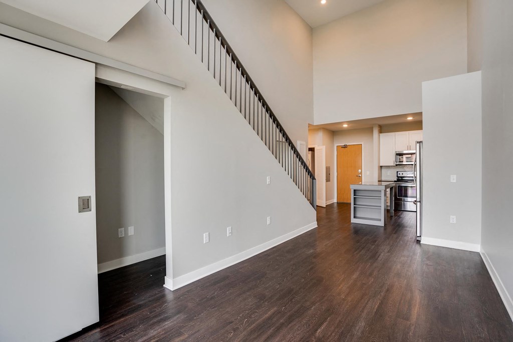 Living space with view of kitchen and bright natural lighting at The Preserve at Normandale Lake