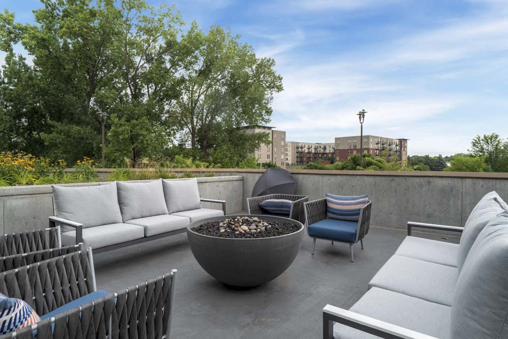 Large sitting area around the fire pit.