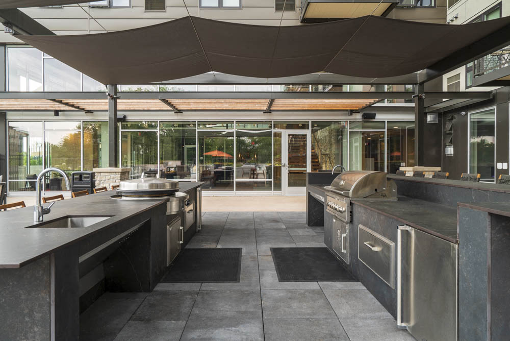 Dual grills as an outdoor amenity.