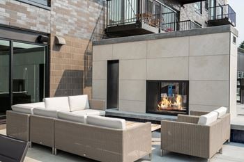 Outdoor lounging space with seating at The Rowan Apartments in Eagan Minnesota