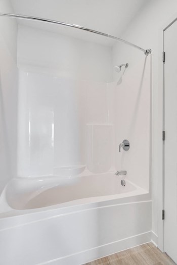 TheRowanLuxuryApartments large Shower and tub combo at The Rowan Apartments in Eagan Minnesota - Photo Gallery 6