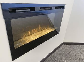 Electric fireplace in the living room at the villas at mahoney park
