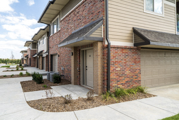 Exterior view of private entrances and garages at The Villas at Falling Waters in west Omaha NE