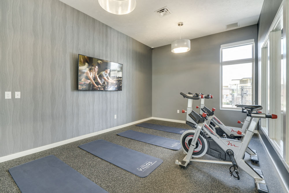 Yoga/spin studio at The Villas at Falling Waters luxury townhomes for rent in west Omaha NE