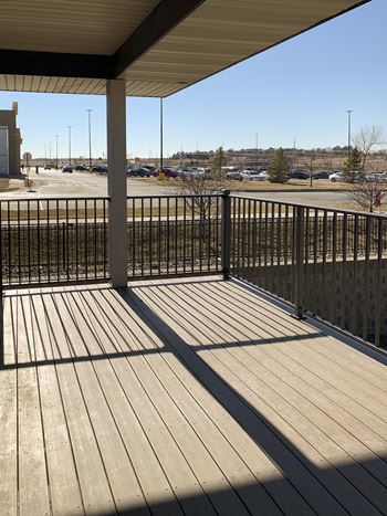 Spacious balcony over looking beautiful greenery at The Villas at Mahoney Park