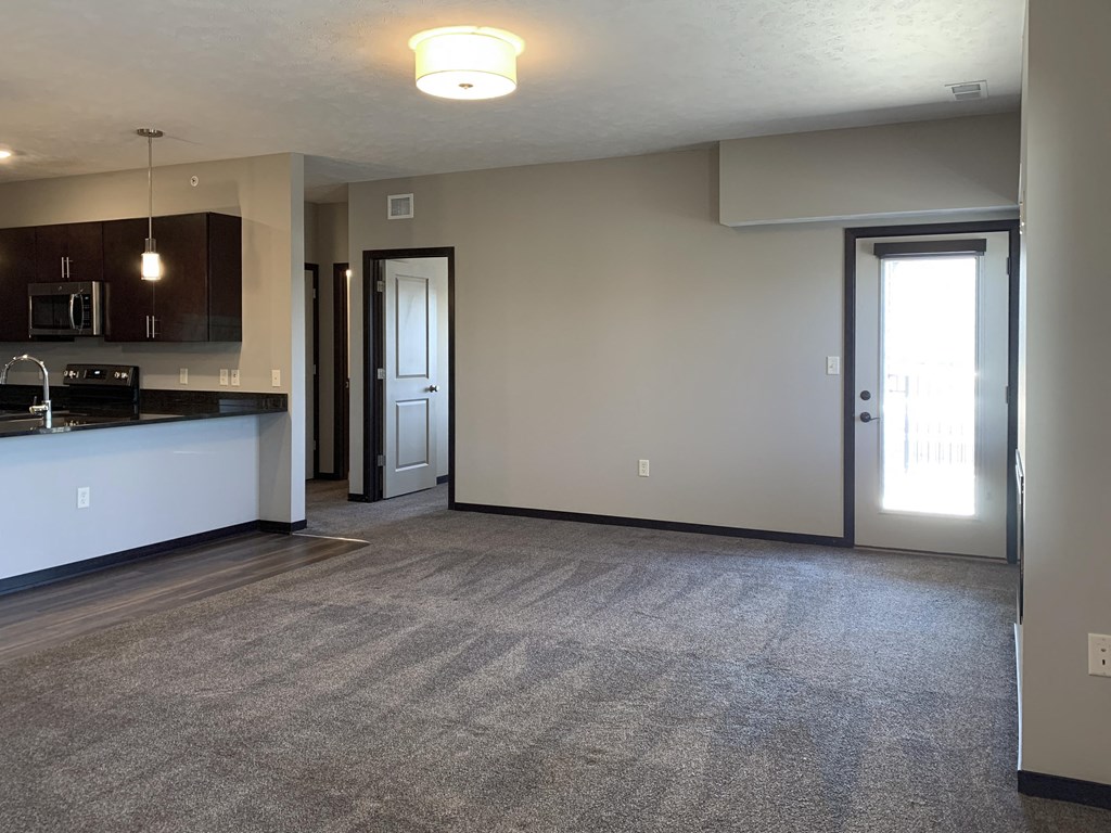 View of the living area with kitchen off to the left side