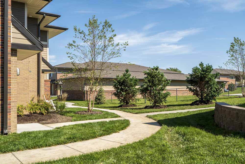Walk paths and green space at The Villas at Mahoney Park