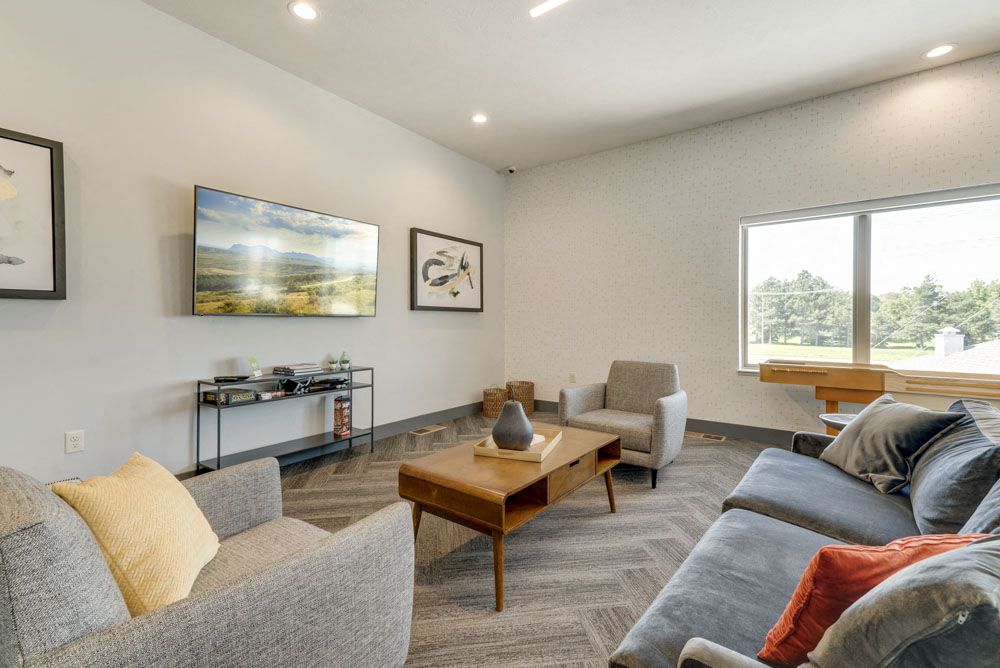 Seating are in the clubhouse at The Villas at Mahoney Park