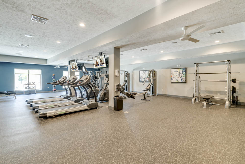Large fitness center with a variety of equipment at The Villas at Mahoney Park