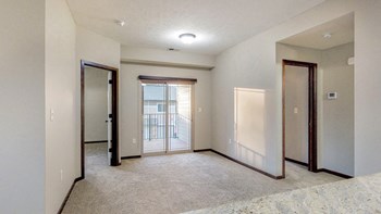 Natural light fills the living and dining space in the Ash at The Villas at Wilderness Ridge in southwest Lincoln NE 68512 - Photo Gallery 48