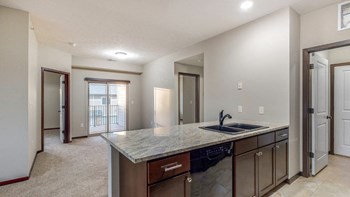 The kitchen in the Ash features a peninsula counter with room for seating. - Photo Gallery 44