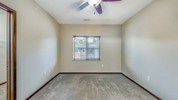 Large bedrooms are filled with natural light in the Ash at at The Villas at Wilderness Ridge luxury apartments in southwest Lincoln NE 68512 - Photo Gallery 71