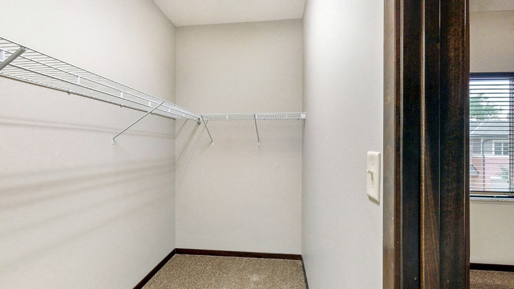 Walk in closet in the Ash 2 bedroom at The Villas at Wilderness Ridge luxury apartments in southwest Lincoln NE 68512