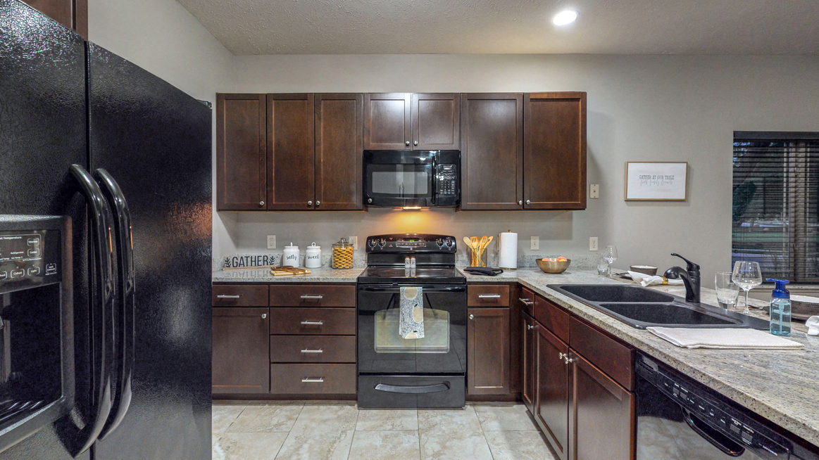 You'll love the abundant storage in the kitchen in this Cedar floor plan at The Villas at Wilderness Ridge - Photo Gallery 65