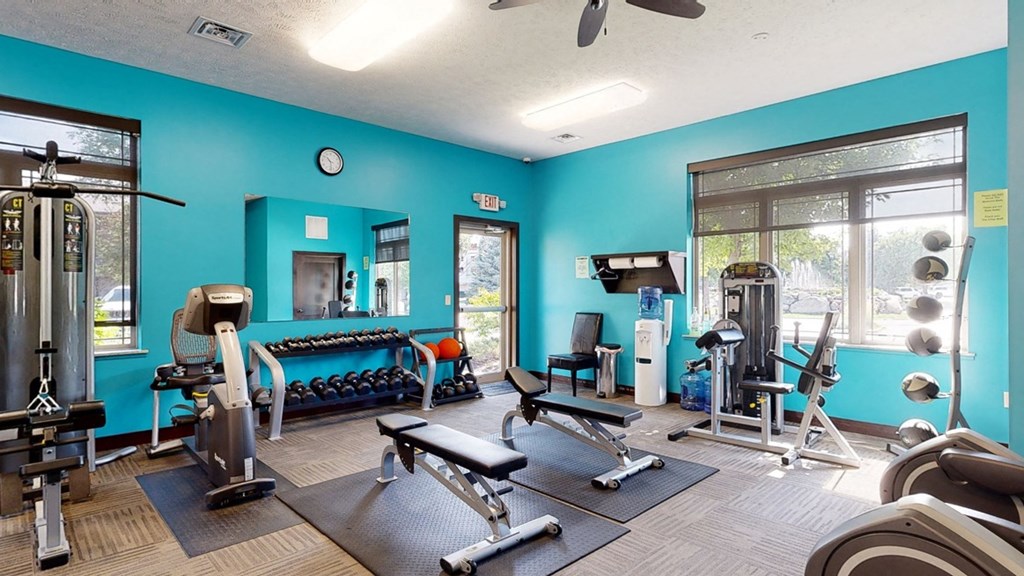 24 hour fitness center with strength training equipment and machines at The Villas at Wilderness Ridge  in Lincoln Nebraska
