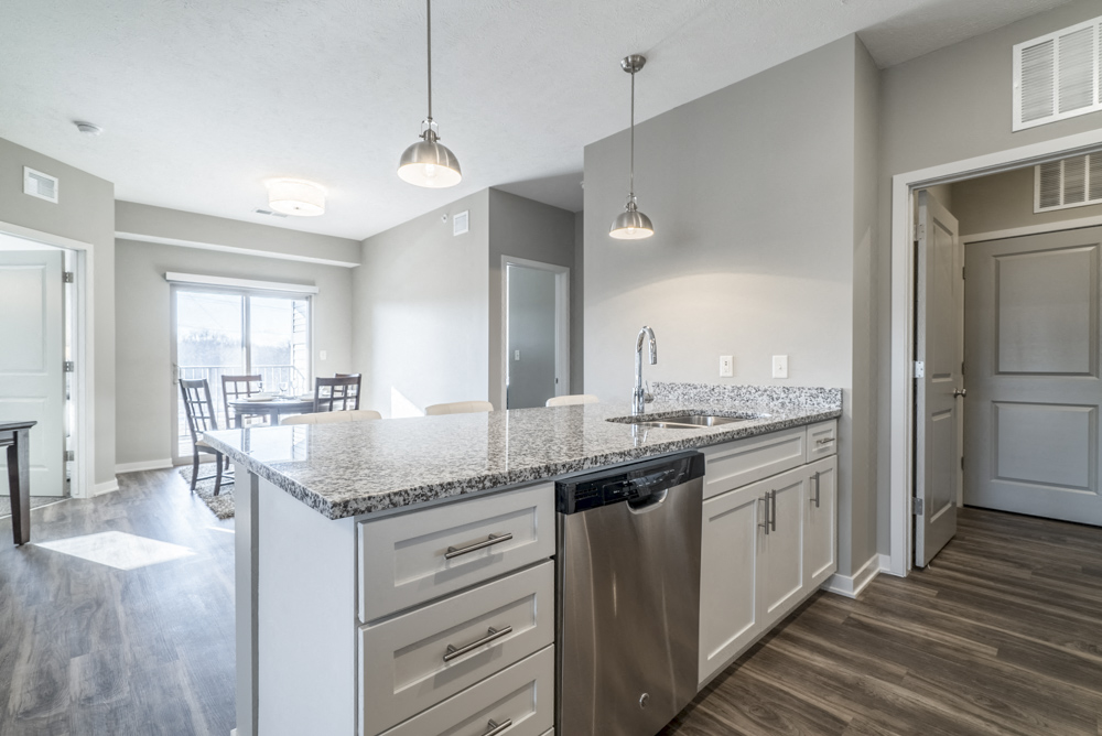 Kitchen with pendant lighting at The Villas at Mahoney Park