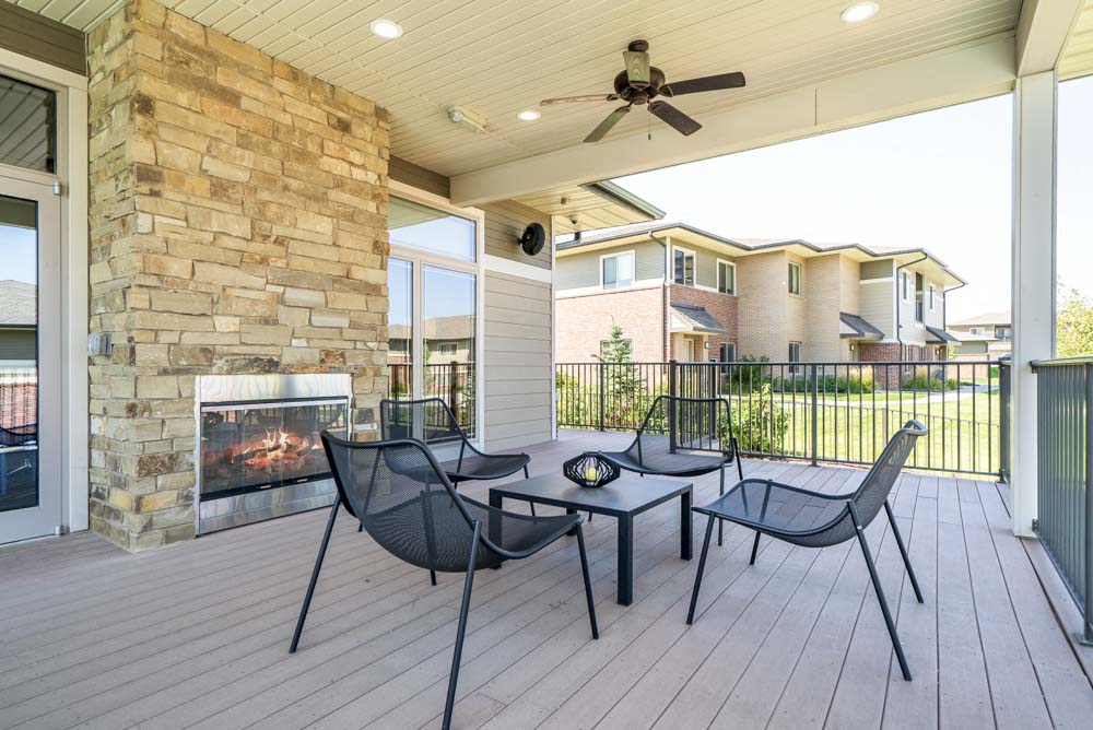 Outdoor fireplace with seating at Villas of Omaha in northwest Omaha NE 68116