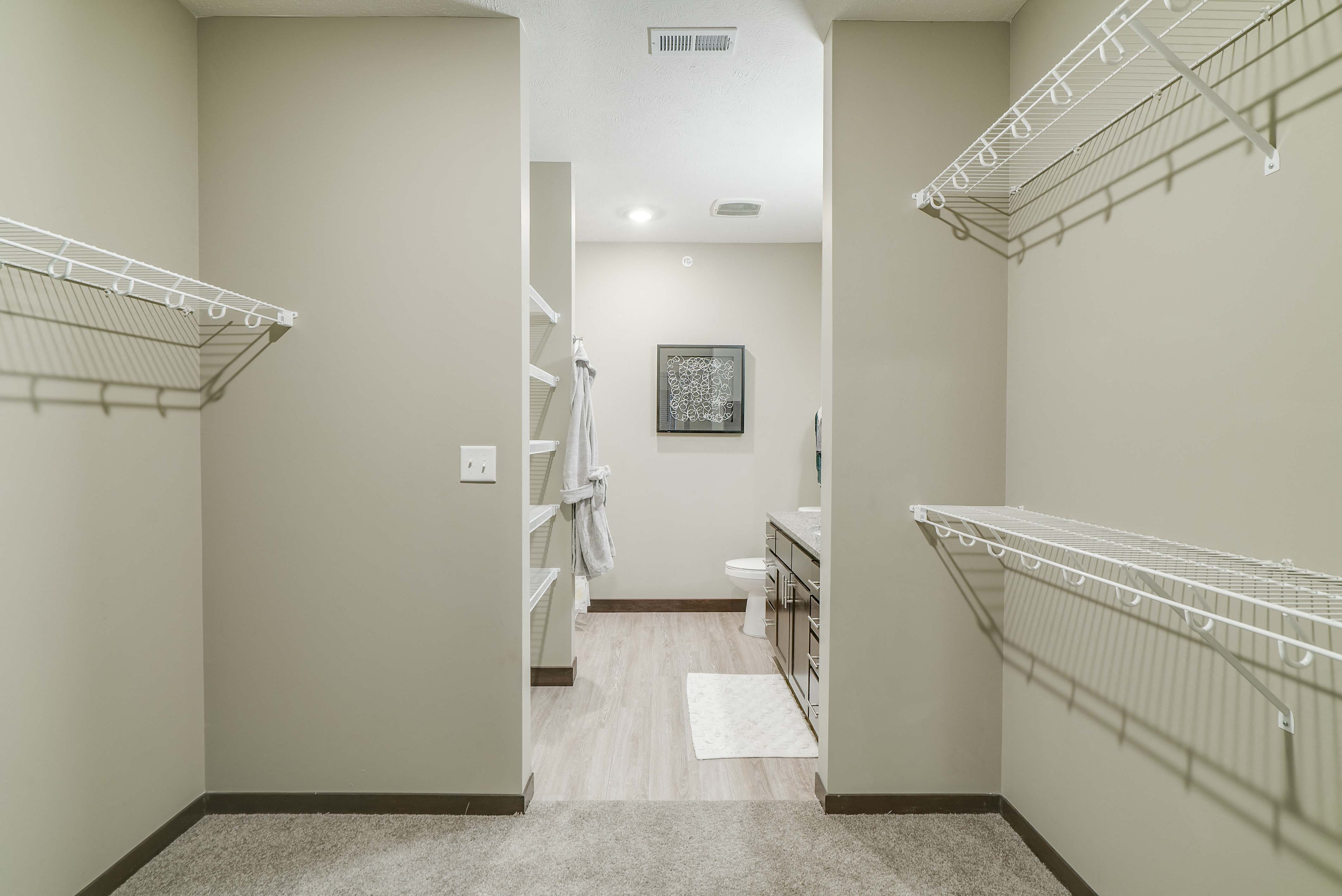 Walk in closet in master bedroom at WH Flats new luxury apartments in south Lincoln NE 68516