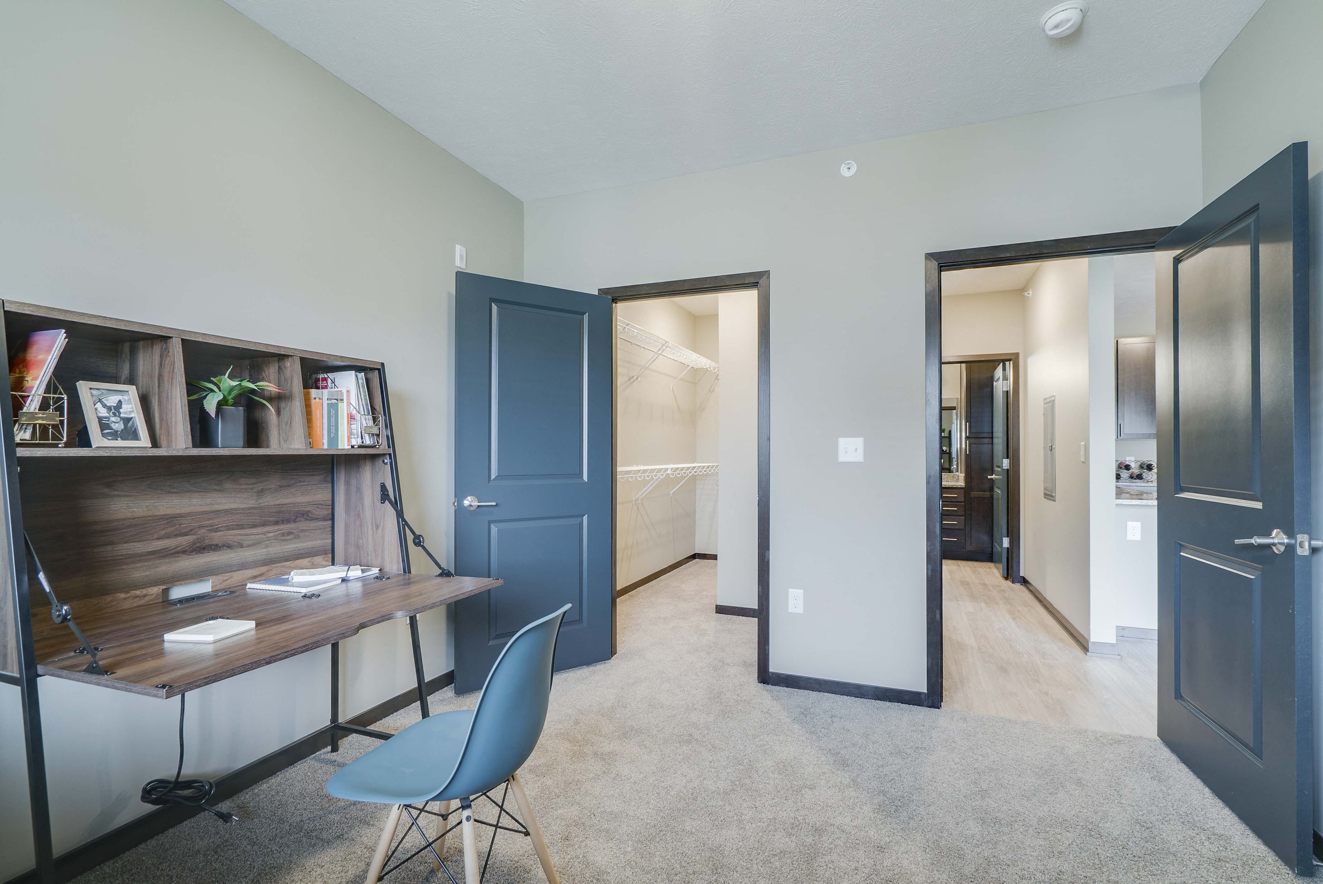 large bedroom with walk in closet at WH Flats new luxury apartments in south Lincoln NE 68516