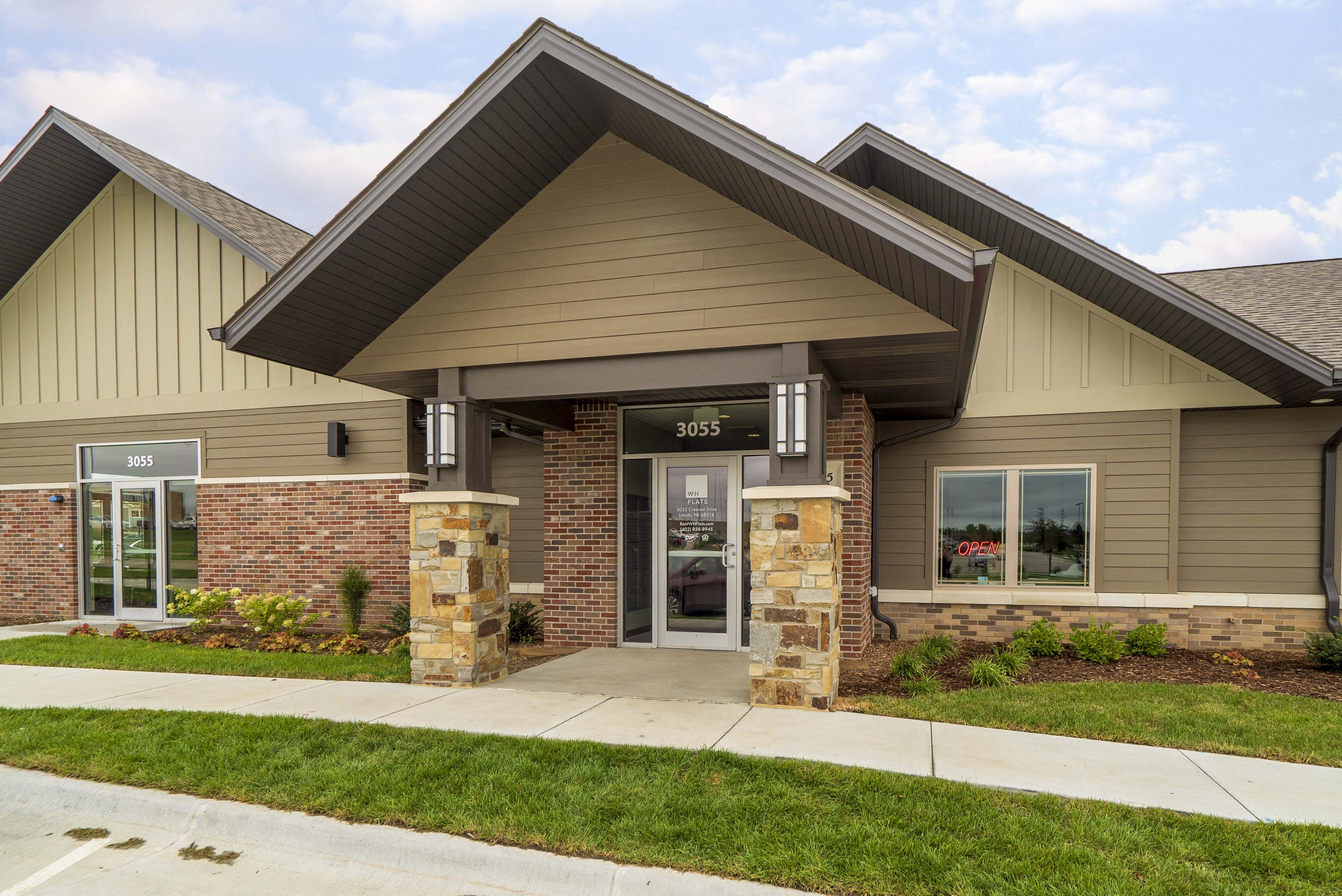 Exterior view of WH Flats clubhouse new luxury apartments in south Lincoln NE 68516