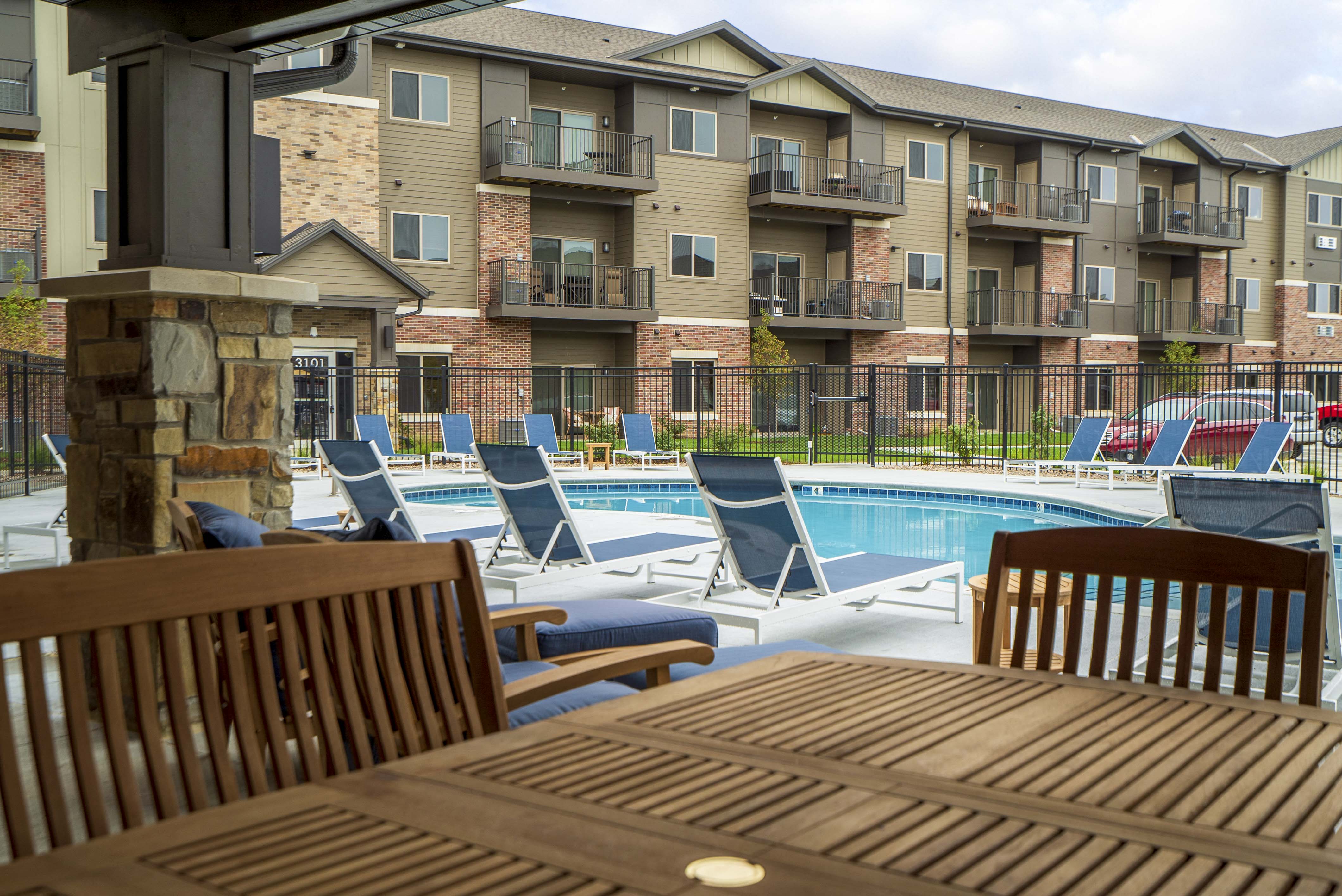 Exteriors - Relaxing patio, Luxury pool and hot tub view of WH Flats new luxury apartments in south Lincoln NE 68516