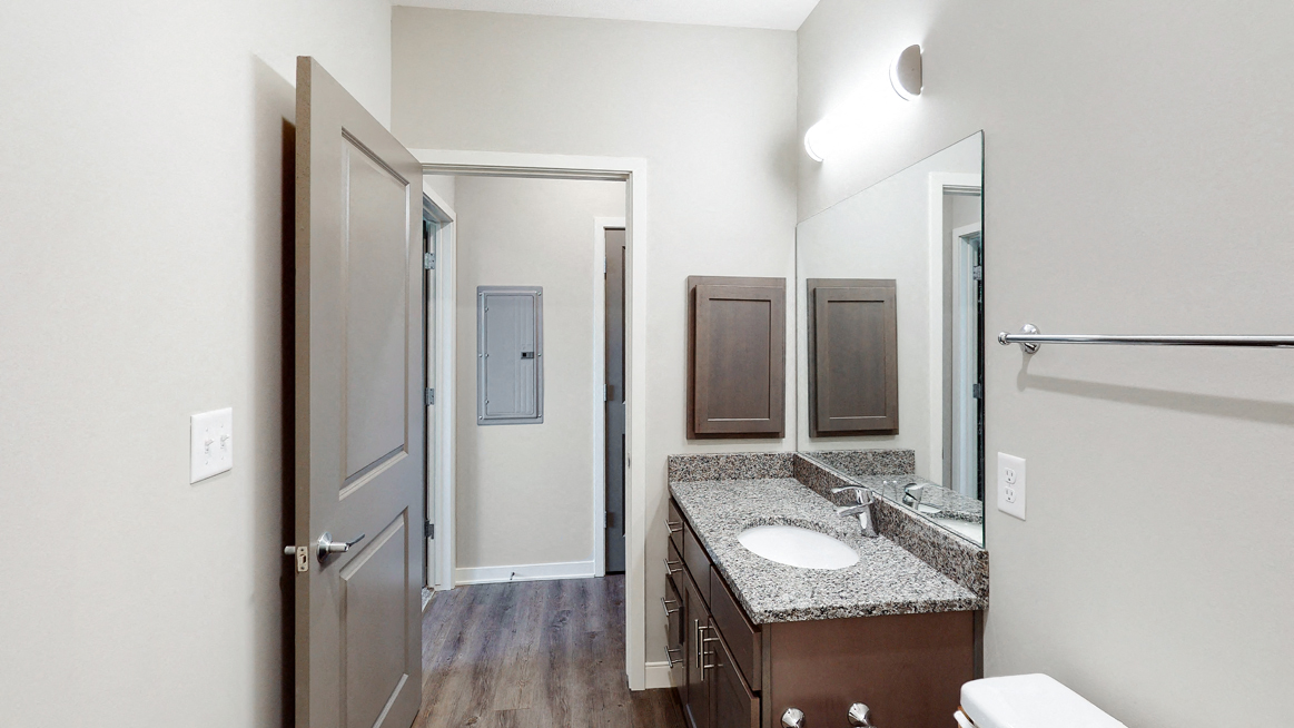 The 2 bedroom Marigold with den floor plan features 2 spacious bathrooms with granite vanity top and abundant storage.