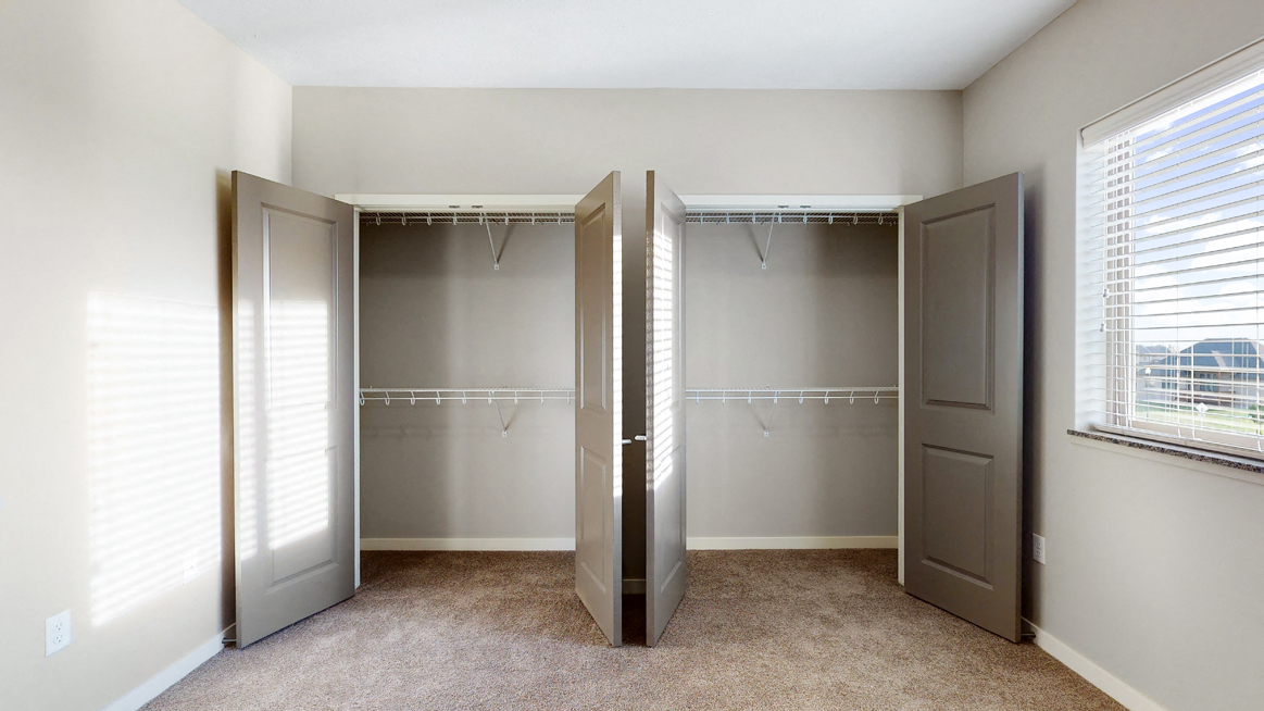 The 2 bedroom Marigold with den floor plan features incredibly spacious closets with abundant storage.