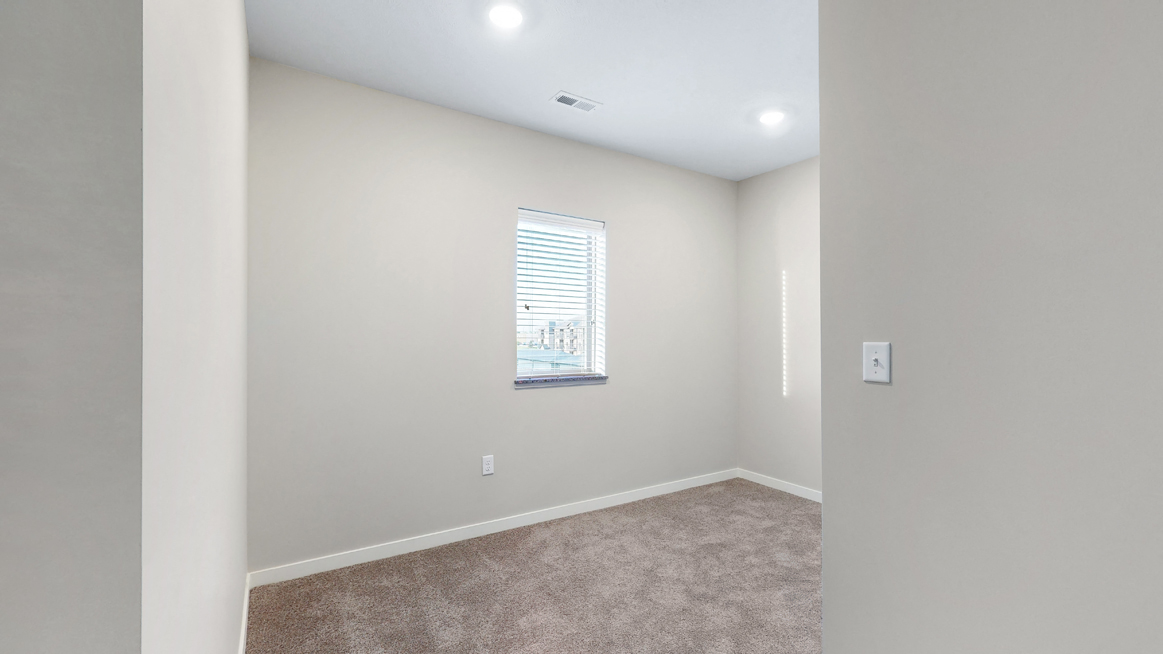 The den area in the 2 bedroom Marigold with den floor plan is perfect for a desk or reading nook.