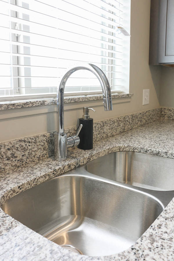 Grohe-brand faucet in kitchen at WH Flats new luxury apartments in south Lincoln NE 68516