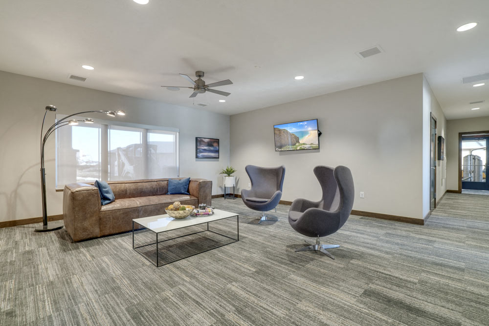 Clubhouse leasing lounge at WH Flats apartments in south Lincoln NE