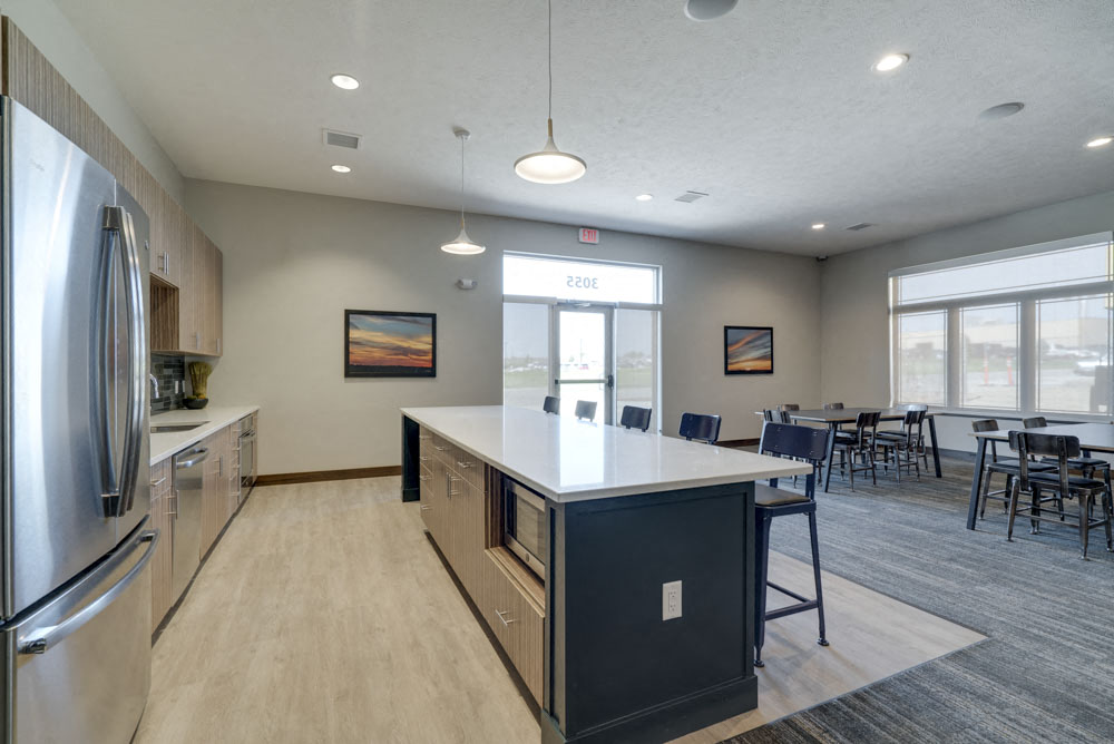 Resident clubhouse with kitchen and seating