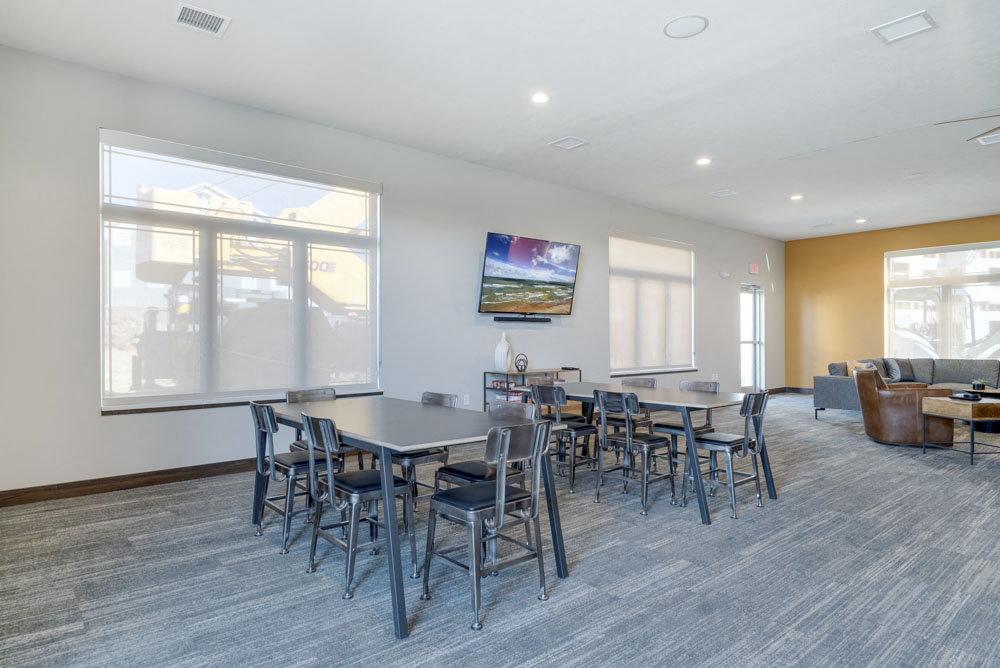 Resident clubhouse with seating and lounge sofas