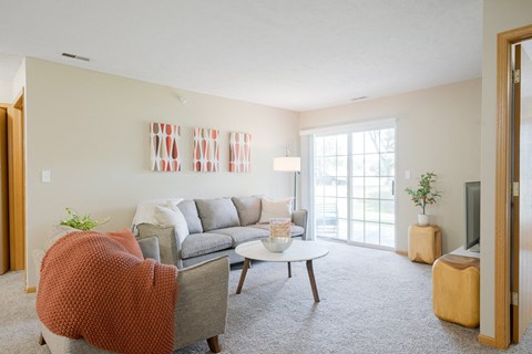 a living room with a couch and a coffee table